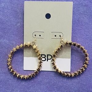 BP GOLD TONE STAR CIRCULAR DANGLING EARRINGS